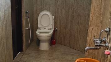 Shower, rainfall showerhead, towels, soap