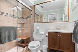 Shower, hair dryer, towels