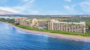 A beachfront hotel with multiple buildings, a pool, and a view of the ocean. - Sugar Beach Resort, #235 1 Bedroom Condo by RedAwning (Kihei)