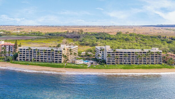 A coastal hotel with multiple buildings, a beachfront, and a clear view of the sea. - Sugar Beach Resort, #235 1 Bedroom Condo by RedAwning (Kihei)