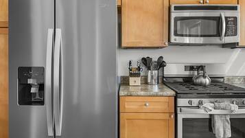 Condo, 2 Bedrooms | Private kitchen | Fridge, oven, coffee/tea maker, toaster