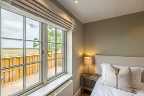 2 slaapkamers, een bureau, een strijkplank/strijkijzer, internet