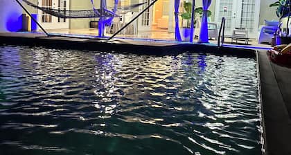 “Peaceful villa with pool, near lakes, shops & highways – perfect getaway”