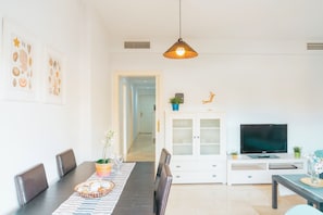 Family Apartment, 2 Bedrooms | Living area | Flat-screen TV - Sky Sea Holidays Mijas Costa (Mijas)