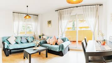 Family Apartment, 2 Bedrooms | Living area | Flat-screen TV