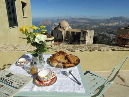 Noble palace with a sky view in the mountains, near the historic center of Erice