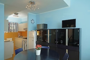 Apartment, Lake View | Living area | 35-inch TV with digital channels - Il Melagrano A6 by Wonderful Italy (Padenghe sul Garda)
