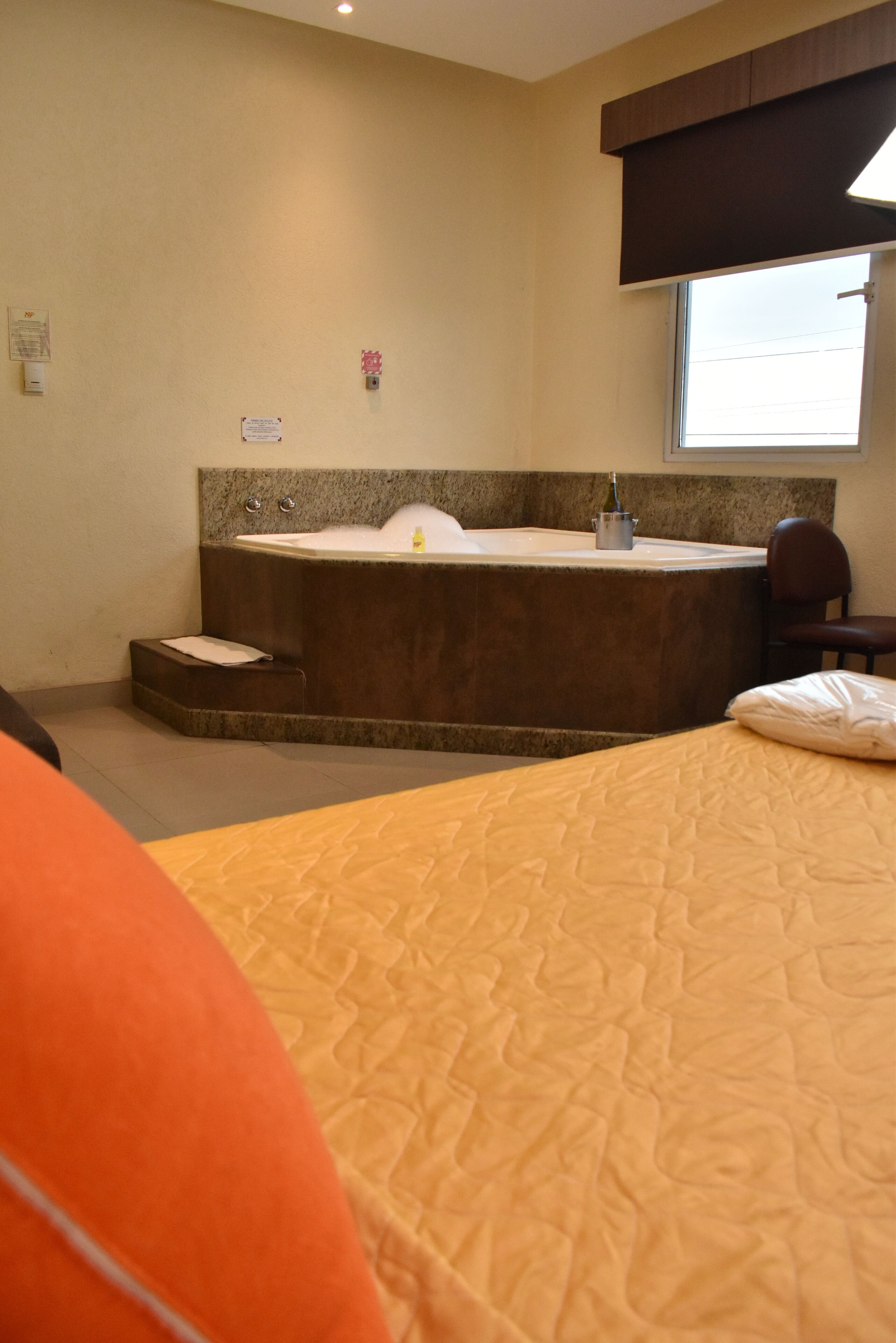 Desk, laptop workspace, blackout drapes, iron/ironing board