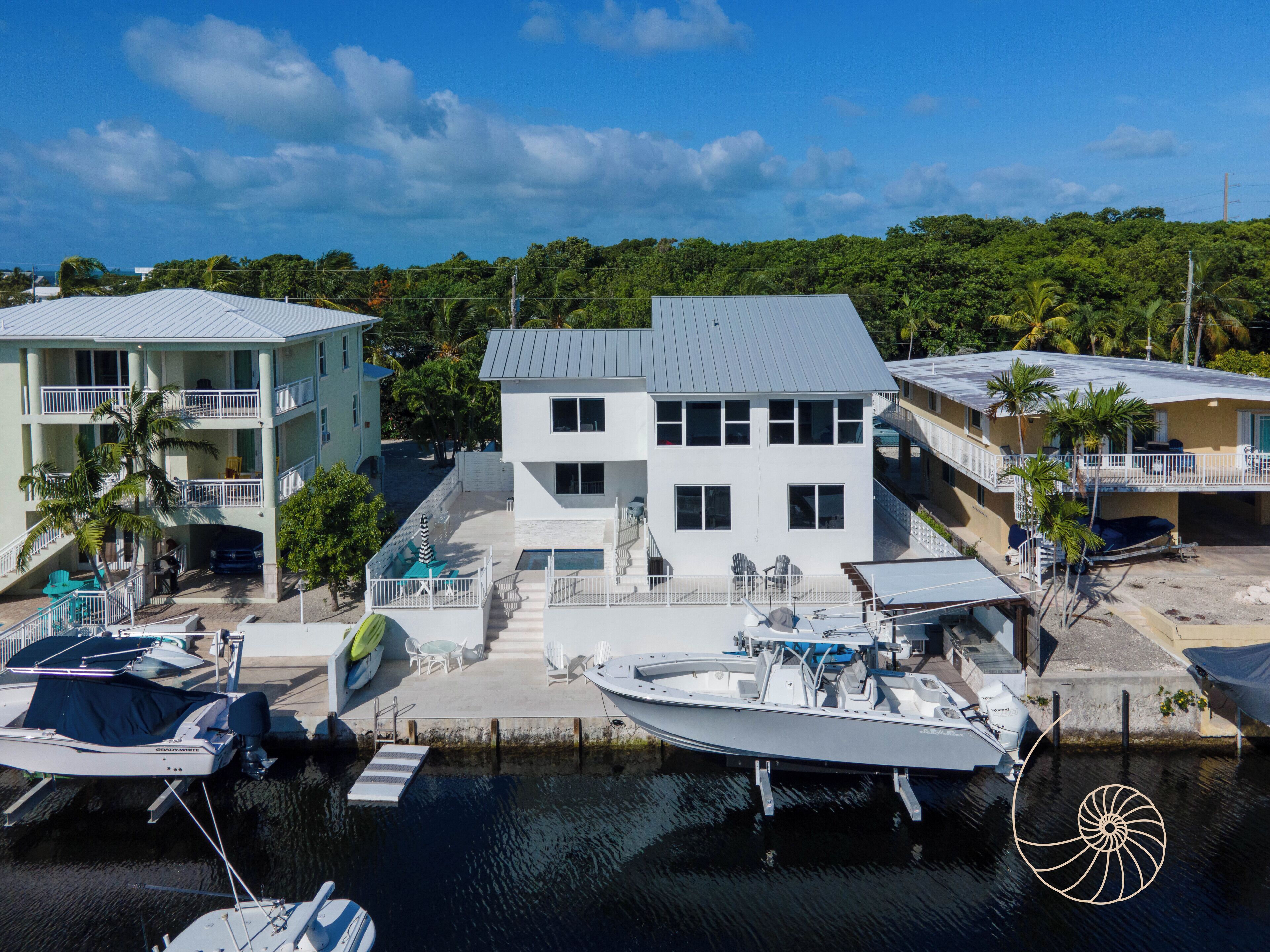 Coco Plum Cove ~ Stylish 4 Bedroom / 3 Bath Canal Home in Key Largo