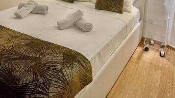 1 slaapkamer, een strijkplank/strijkijzer, gratis wifi, beddengoed