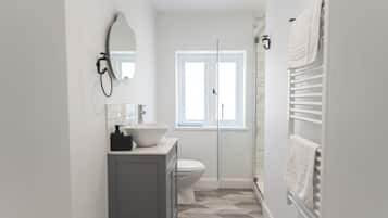 Appartement | Badkamer | Een douche, een haardroger, handdoeken, toiletpapier