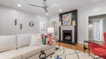 Smart TV, fireplace, books, music library