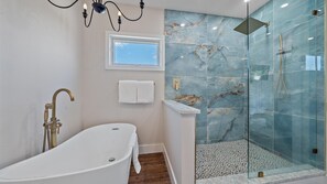 Shower, hair dryer, towels