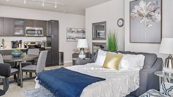 1 bedroom, desk, iron/ironing board, travel crib