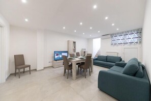 Departamento | Área de sala de estar | Televisión de pantalla plana de 32 pulgadas con canales por cable 