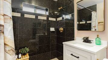 Hair dryer, towels, soap, shampoo