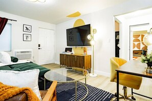 1 bedroom, desk, iron/ironing board, travel cot