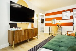 1 bedroom, desk, iron/ironing board, travel crib