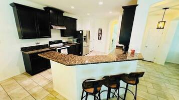 Microwave, toaster, cookware/dishes/utensils