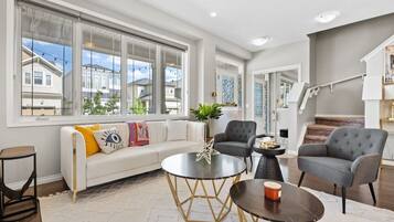 Smart TV, fireplace, books, offices