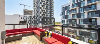 New Multi-Level Townhome with Rooftop & Parking