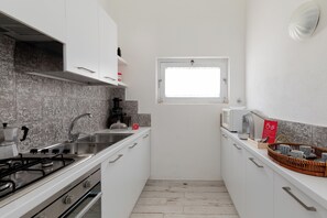 Apartment, Sea View | Private kitchen | Espresso maker - Casa dell'Asfodelo by Wonderful Italy (Budoni)