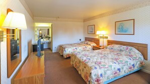 A hotel room with two beds, a desk, a mirror, and two wall-mounted lamps. - Hotel O Relax Inn Lewisburg near I-64 (Lewisburg)