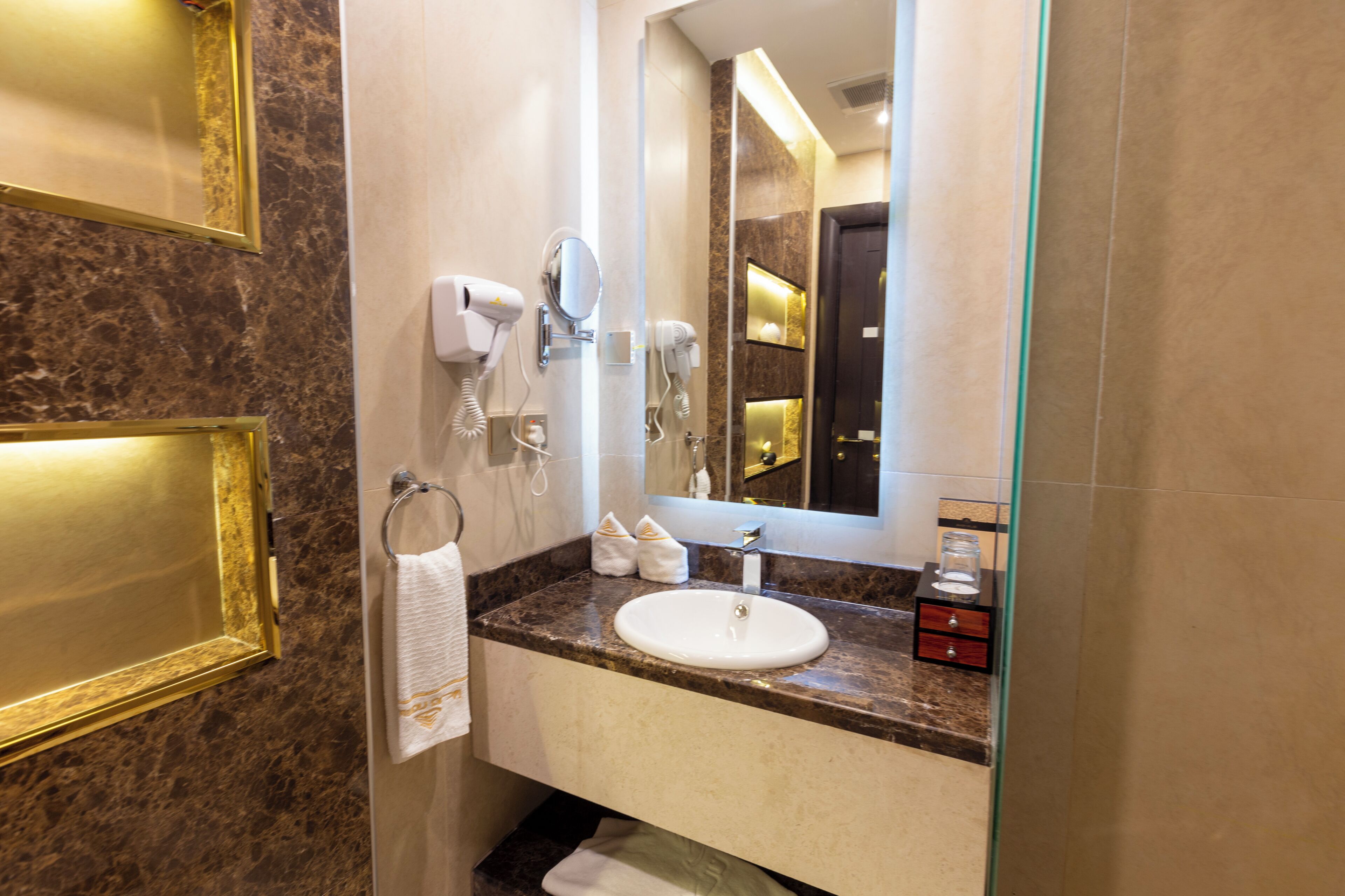Hair dryer, slippers, bidet, towels