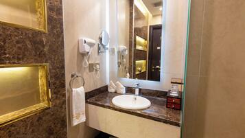 Hair dryer, slippers, bidet, towels