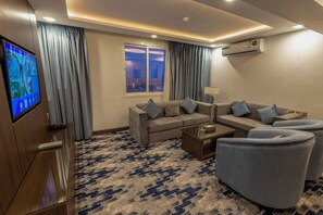 Family Suite | Living area | TV - Aman Hotel Almhalh (Abha)