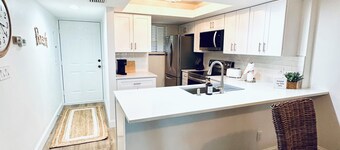 New! Just renovated coastal condo, Gated community, 10 min to beach by shuttle! 