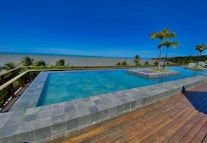 Outdoor pool, open 8:00 AM to 8:00 PM, pool umbrellas, pool loungers - UNITY Cabo Branco by Penareia.tur.br (João Pessoa)