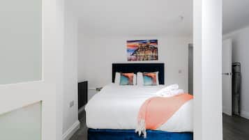 Departamento Deluxe, baño privado, vista a la ciudad | 1 habitación, ropa de cama hipoalergénica y internet