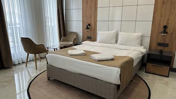 Deluxe Double Room, Non Smoking, City View | In-room safe, desk, laptop workspace, blackout drapes