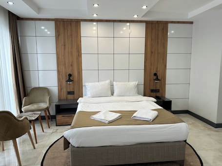 Deluxe Double Room, Non Smoking, City View | In-room safe, individually decorated, individually furnished, desk