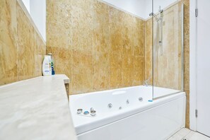 Hair dryer, towels, soap, shampoo