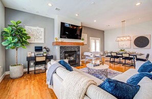 TV, fireplace, books, offices