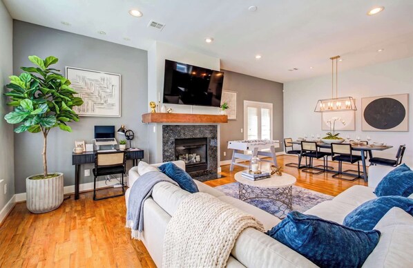 TV, fireplace, books, offices