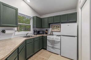 Fridge, microwave, oven, stovetop - Pet-Friendly Retreat, Walk to Downtown (Saugatuck)