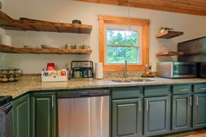 Coffee/tea maker, fridge, microwave, oven