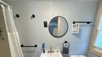Shower, towels, soap, toilet paper