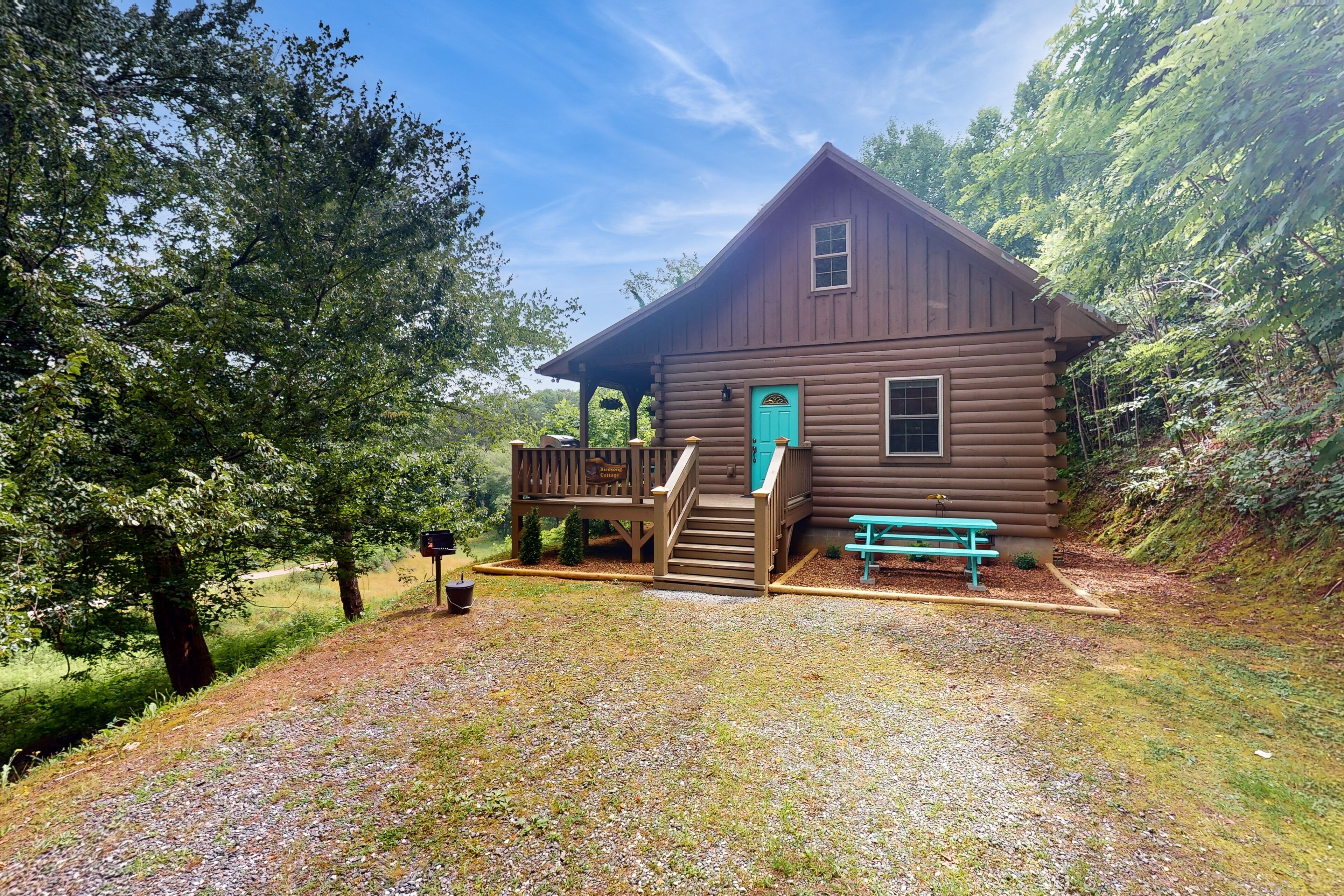 Serene mountain escape with hot tub, dog-friendly, stunning views, & cozy loft