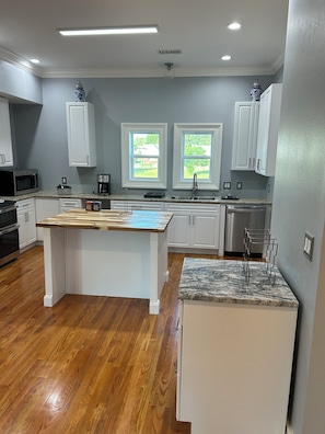 Oven, stovetop, dishwasher, coffee/tea maker