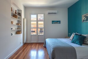 Apartment, Balcony | 2 bedrooms, laptop workspace, iron/ironing board, cribs/infant beds