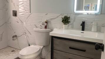 Hair dryer, towels, soap, shampoo