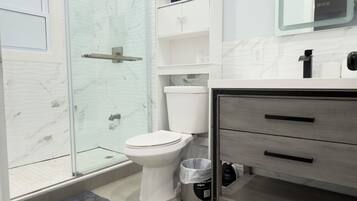 Hair dryer, towels, soap, shampoo