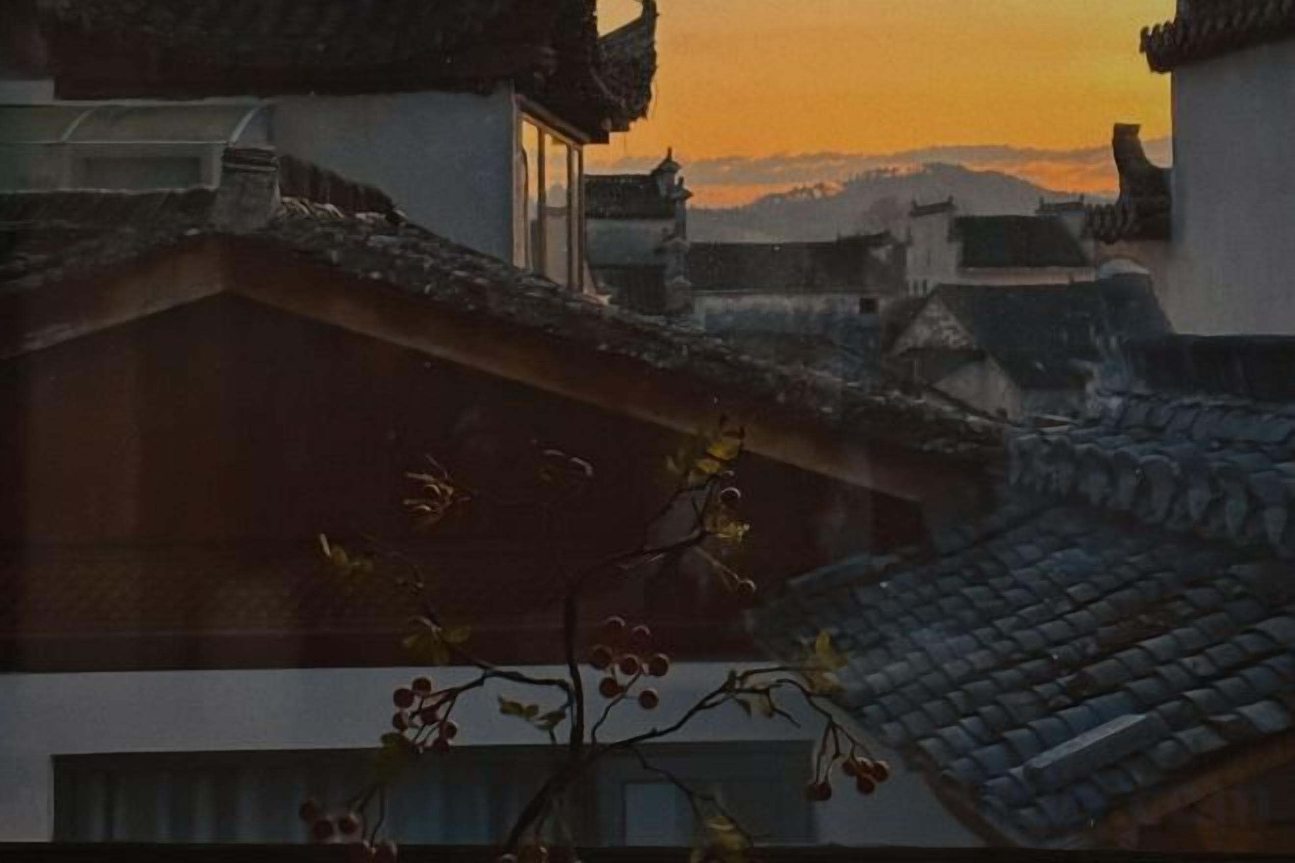 A traditional building with a tiled roof and a window.