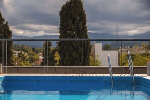 Relax by the pool surrounded by breathtaking views of the surrounding landscape.