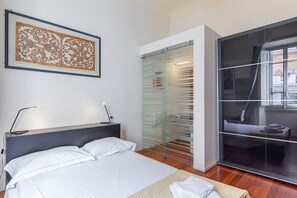 1 slaapkamer, een strijkplank/strijkijzer, internet, beddengoed