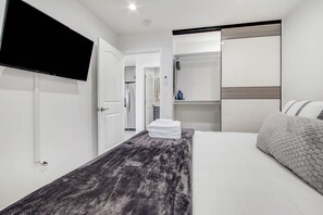 1 dormitorio, tabla de planchar con plancha, wifi gratis y ropa de cama